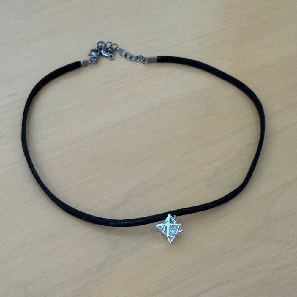 Black choker necklace with silver pendant